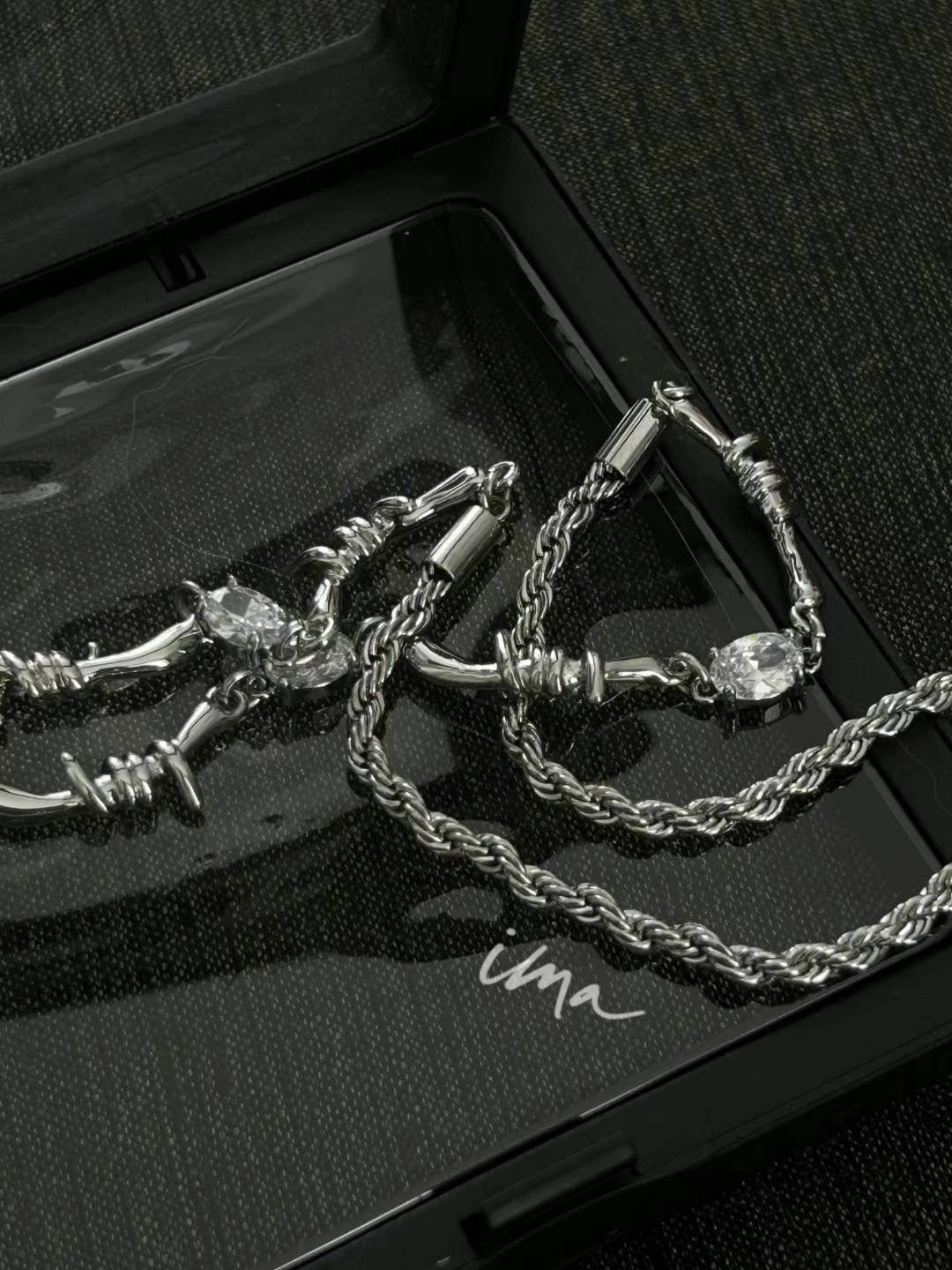 Zircon wrapped clavicle chain