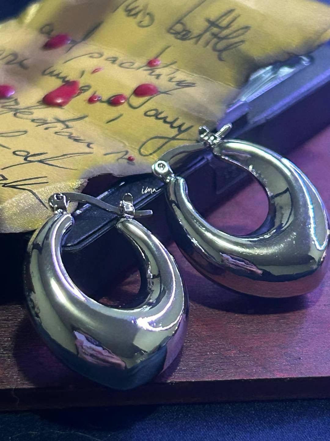 Plain horseshoe hoop earrings