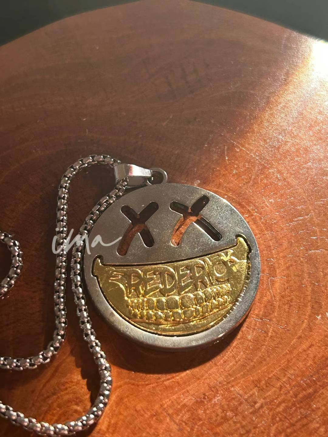frederick silver smile necklace