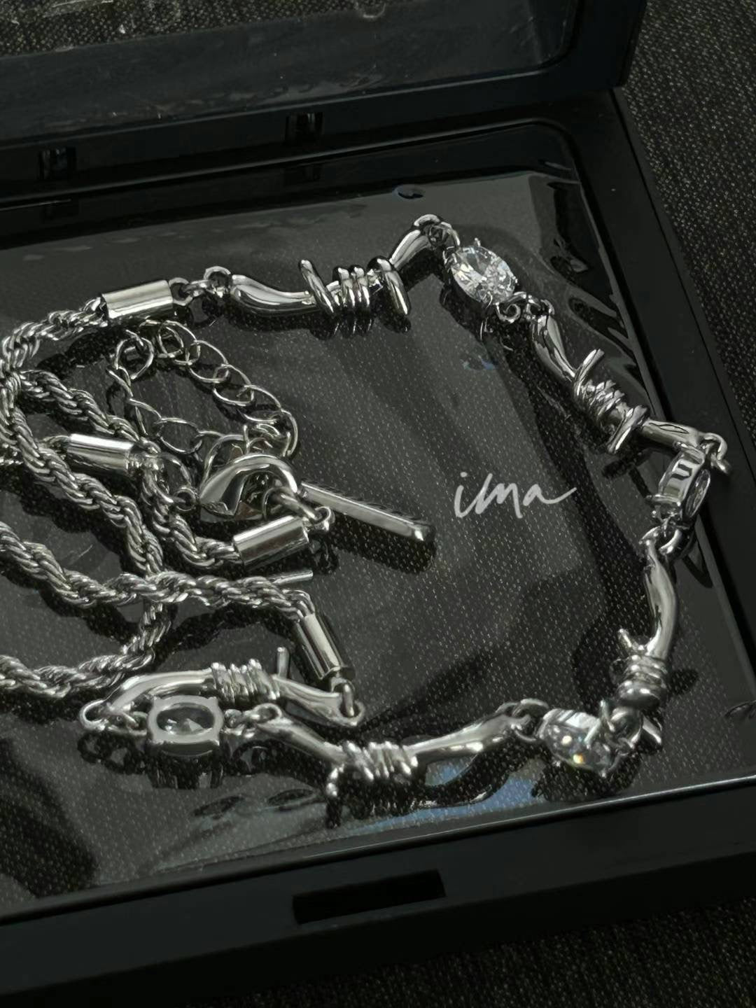 Zircon wrapped clavicle chain