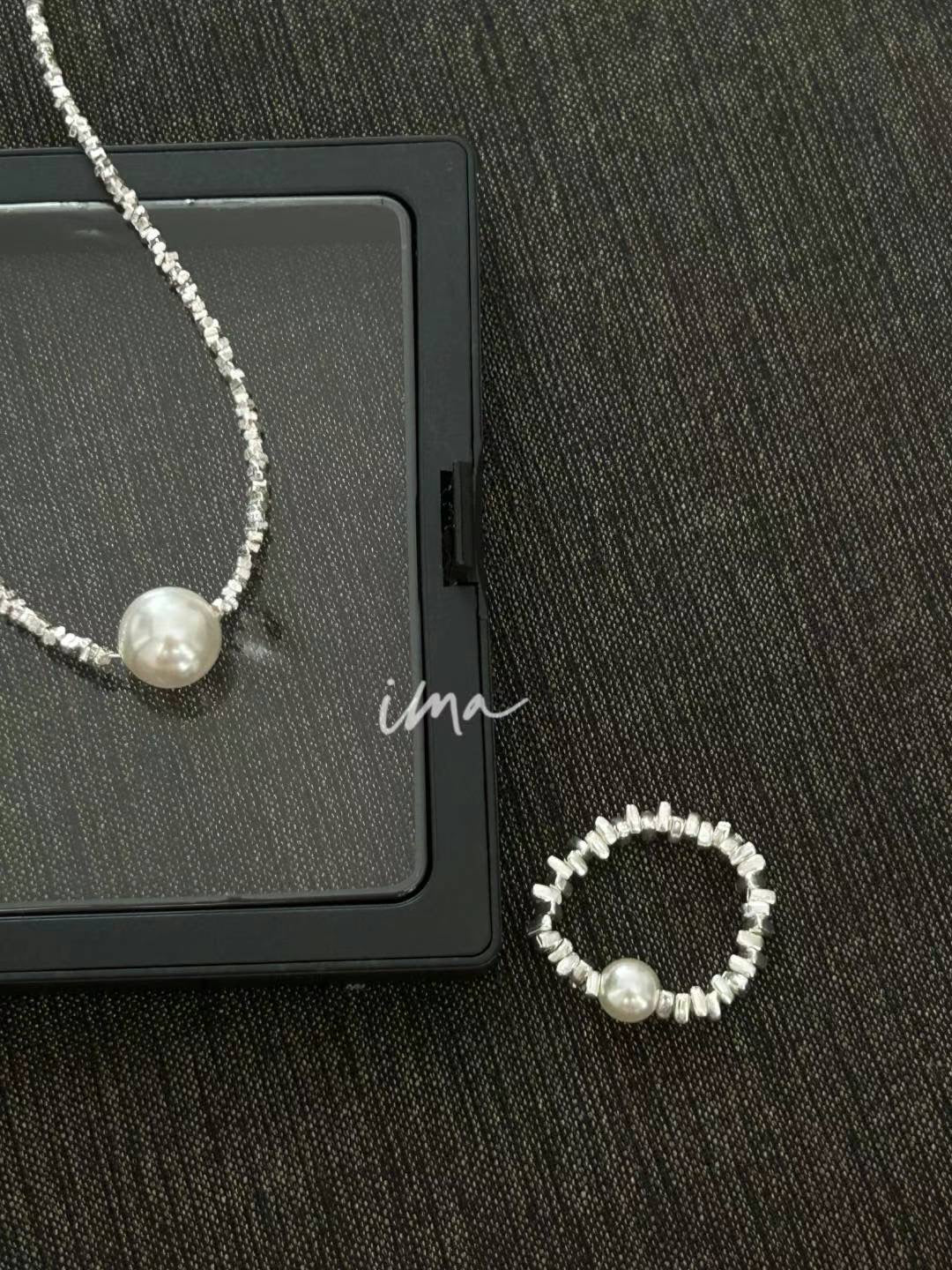 Broken silver pearl set