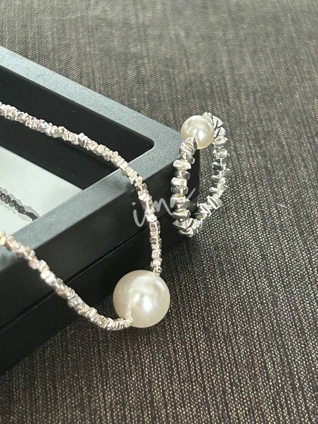 Broken silver pearl set