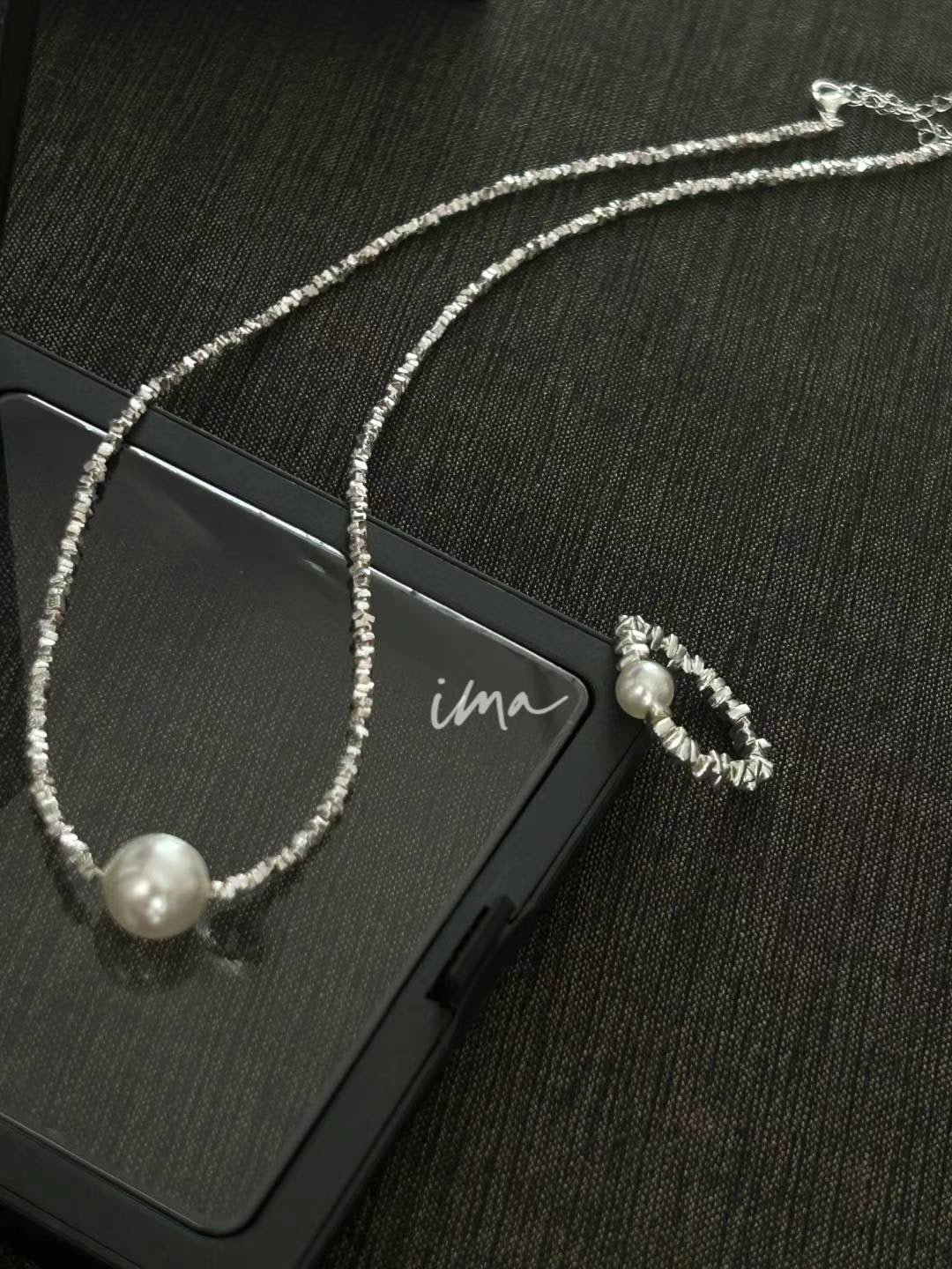 Broken silver pearl set