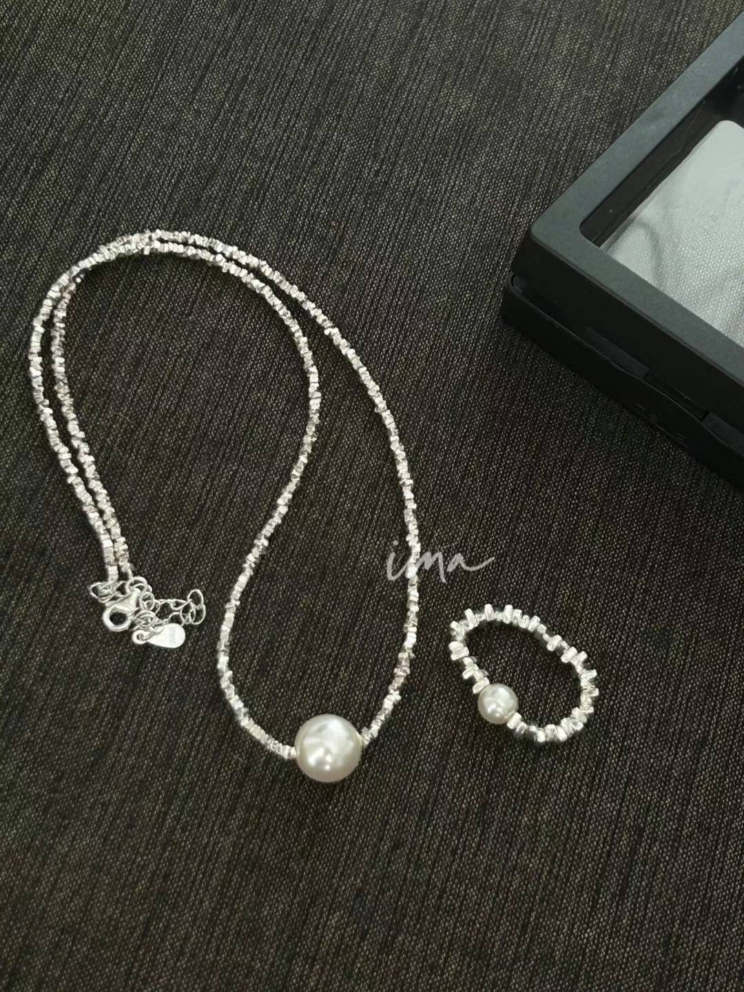 Broken silver pearl set