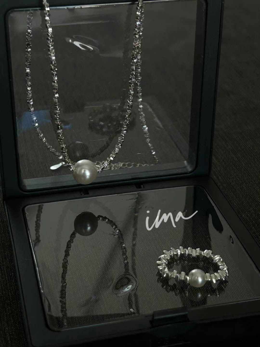 Broken silver pearl set