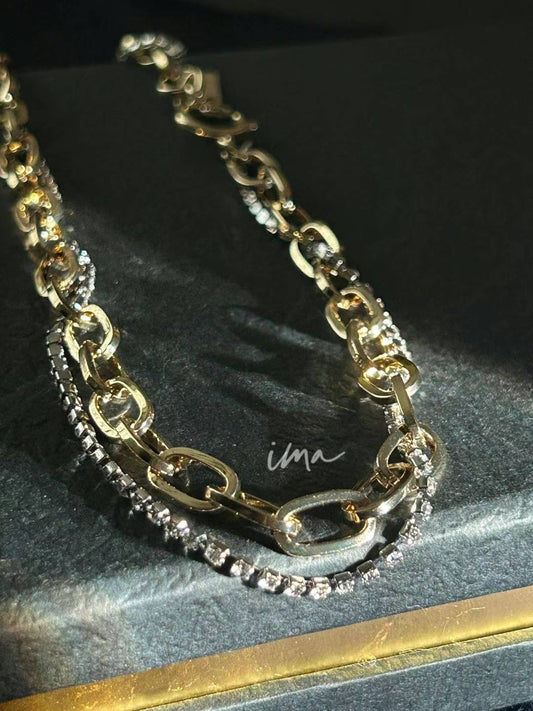 Gold clavicle chain set with diamonds